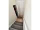 Staircase leading to upper level with coat closet at 14167 Sun Blaze # C, Broomfield, CO 80023