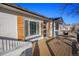 Updated home exterior with a deck and stylish facade at 4979 S Van Gordon St, Morrison, CO 80465