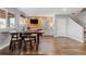 Basement bar area with seating and mini-fridge at 3093 Belay Pt, Castle Rock, CO 80108