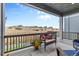 Covered deck overlooking backyard and neighborhood at 3093 Belay Pt, Castle Rock, CO 80108
