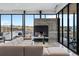 Community room with modern fireplace and seating area at 3093 Belay Pt, Castle Rock, CO 80108