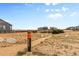 A paved trail in a neighborhood with homes in the background at 3093 Belay Pt, Castle Rock, CO 80108