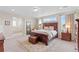 Main bedroom with attached bath and plenty of natural light at 3093 Belay Pt, Castle Rock, CO 80108