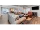 Spacious basement living area with comfortable seating and access to the backyard at 3093 Belay Pt, Castle Rock, CO 80108