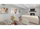 Living room features a fireplace, modern decor and kitchen at 2525 S Dayton Way # 1109, Denver, CO 80231