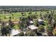 Aerial view of community near golf course and city views at 2525 S Dayton Way # 1109, Denver, CO 80231