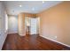 Spacious bedroom with hardwood floors and built-in closet at 17575 E Kettle Pl, Centennial, CO 80016