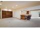 Finished basement featuring a bar and ample storage at 17575 E Kettle Pl, Centennial, CO 80016