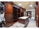 Large walk-in closet with ample shelving and built-in storage at 17575 E Kettle Pl, Centennial, CO 80016