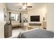 Bedroom with access to patio and living room views at 1820 Newland Ct # 213, Lakewood, CO 80214