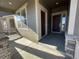 Covered front porch with double doors and sidelights at 12909 Range St, Firestone, CO 80504