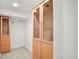 Finished basement with built-in shelving and cabinetry at 1529 Holly, Denver, CO 80220