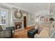 Bright living room features hardwood floors, fireplace, and ample natural light at 1529 Holly, Denver, CO 80220