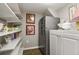 Well-organized basement pantry with ample shelving at 1529 Holly, Denver, CO 80220