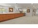 Basement bar with wood cabinetry and wine cooler at 1529 Holly, Denver, CO 80220