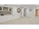 Finished basement with built-in shelving and cabinetry at 1529 Holly, Denver, CO 80220