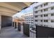 Private balcony with views of the surrounding neighborhood at 1265 Race St # 208, Denver, CO 80206