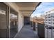 Private balcony with sliding glass door access from inside at 1265 Race St # 208, Denver, CO 80206