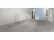 Simple bedroom with gray carpet and access to bathroom at 1265 Race St # 208, Denver, CO 80206