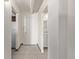 Bright entryway with tile flooring and access to kitchen and bathroom at 1265 Race St # 208, Denver, CO 80206