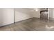 Living room with hardwood floors and kitchen bar at 1265 Race St # 208, Denver, CO 80206