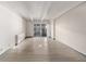 Living room with hardwood floors and sliding glass door to patio at 1265 Race St # 208, Denver, CO 80206