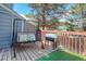 Relaxing deck with seating and artificial turf at 16941 E Chenango Ave # C, Aurora, CO 80015