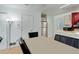 Dining area with table and chairs, adjacent to kitchen at 16941 E Chenango Ave # C, Aurora, CO 80015