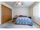 Well-lit bedroom with a double bed and ceiling fan at 2617 E Egbert St, Brighton, CO 80601