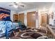 Bedroom with double closets and a view of the hallway at 2617 E Egbert St, Brighton, CO 80601