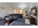 Open living room with kitchen views and a comfortable sectional sofa at 2617 E Egbert St, Brighton, CO 80601