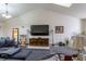 Vaulted ceilings, large TV, and comfortable seating define this living room at 2617 E Egbert St, Brighton, CO 80601