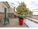 Private backyard patio with space for grilling and relaxing at 2617 E Egbert St, Brighton, CO 80601