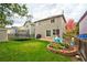 Spacious backyard with patio and garden at 6139 Shamrock Cir, Frederick, CO 80530