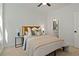 Cozy bedroom with a comfortable bed and en-suite bathroom at 2292 S Dexter St # 1, Denver, CO 80222