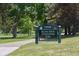 Entrance to Mamie Doud Eisenhower Park, featuring a well-maintained park path at 2292 S Dexter St # 1, Denver, CO 80222