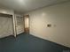 Unfinished basement with laundry hookups and a door at 11479 E 1St Ave, Aurora, CO 80010