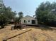 House with deck and spacious backyard at 11479 E 1St Ave, Aurora, CO 80010