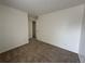 Well-lit bedroom with neutral walls and carpet, featuring a closet at 11479 E 1St Ave, Aurora, CO 80010
