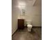 Basement bathroom with toilet and vanity at 11479 E 1St Ave, Aurora, CO 80010