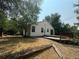 House exterior showcasing a deck and a spacious backyard at 11479 E 1St Ave, Aurora, CO 80010