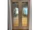 Double doors with stained glass accents at 22141 Chippewa, Golden, CO 80401