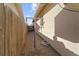 Side yard with gravel and storage shed at 9044 W Center Ave, Lakewood, CO 80226