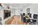 Dining room with hardwood floors and granite fireplace at 1219 Tucson St, Aurora, CO 80011