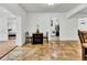Small dining area with a table and chairs, and a view of the laundry room at 1219 Tucson St, Aurora, CO 80011