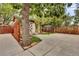Backyard with detached workshop and large concrete patio at 1219 Tucson St, Aurora, CO 80011
