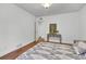 Bedroom with hardwood floors and access to bathroom at 1219 Tucson St, Aurora, CO 80011