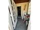 Front entryway with an open door revealing a glimpse into the hallway at 1053 N Colorado Blvd, Denver, CO 80206
