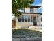 Two-story home with a classic design and a front porch at 1053 N Colorado Blvd, Denver, CO 80206