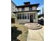 Brick two-story home with a front porch and steps leading to the entrance at 1053 N Colorado Blvd, Denver, CO 80206